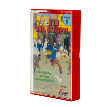 Cover der Tintin Hörspiel Kassette Folge 1 „Die Krabbe mit den goldenen Scheren“ – Originalmotiv mit Tintin, Struppi und Captain Haddock