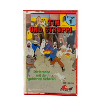 Cover der Tintin Hörspiel Kassette Folge 1 „Die Krabbe mit den goldenen Scheren“ – Originalmotiv mit Tintin, Struppi und Captain Haddock
